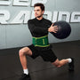 Man exercising with a medicine ball in a gym setting